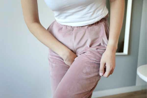 woman struggling with urine incontinence Rochdale